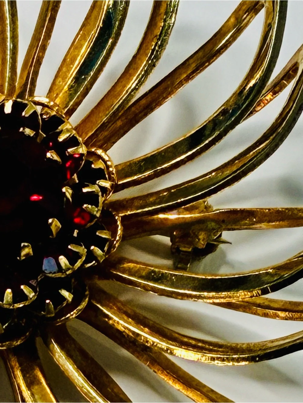 Sarah Coventry Gold-tone Sunburst Brooch with Deep Red Center
